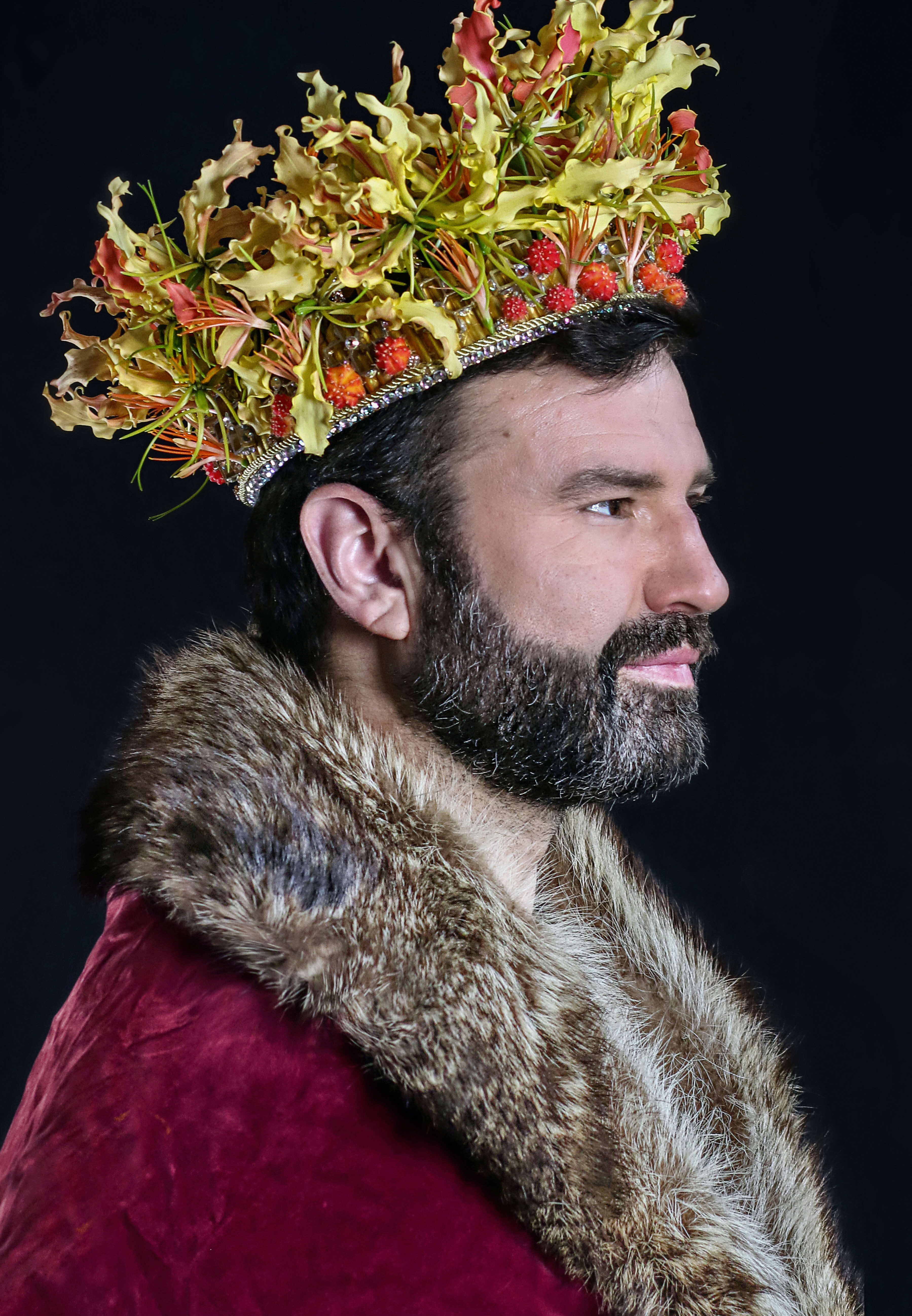 Man with floral crown